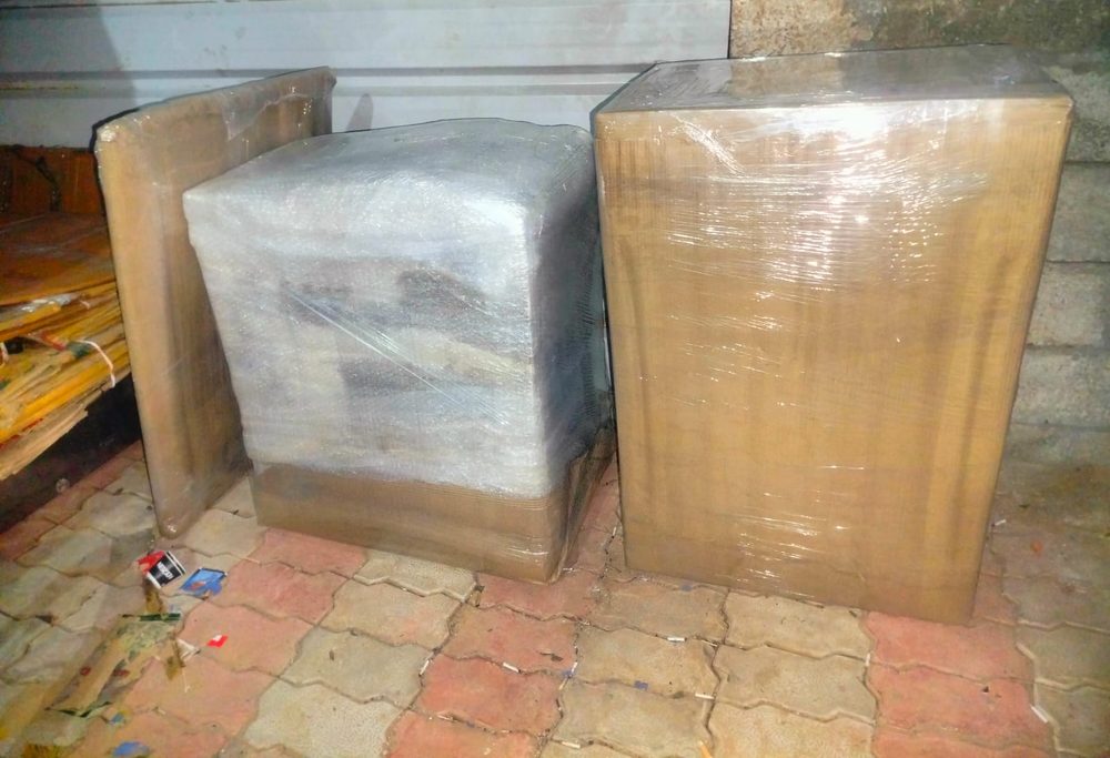 Furniture wrapped and staged for a move in Jaipur